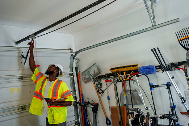 Professional Garage Door Panel Replacement technician working in Minneota, MN